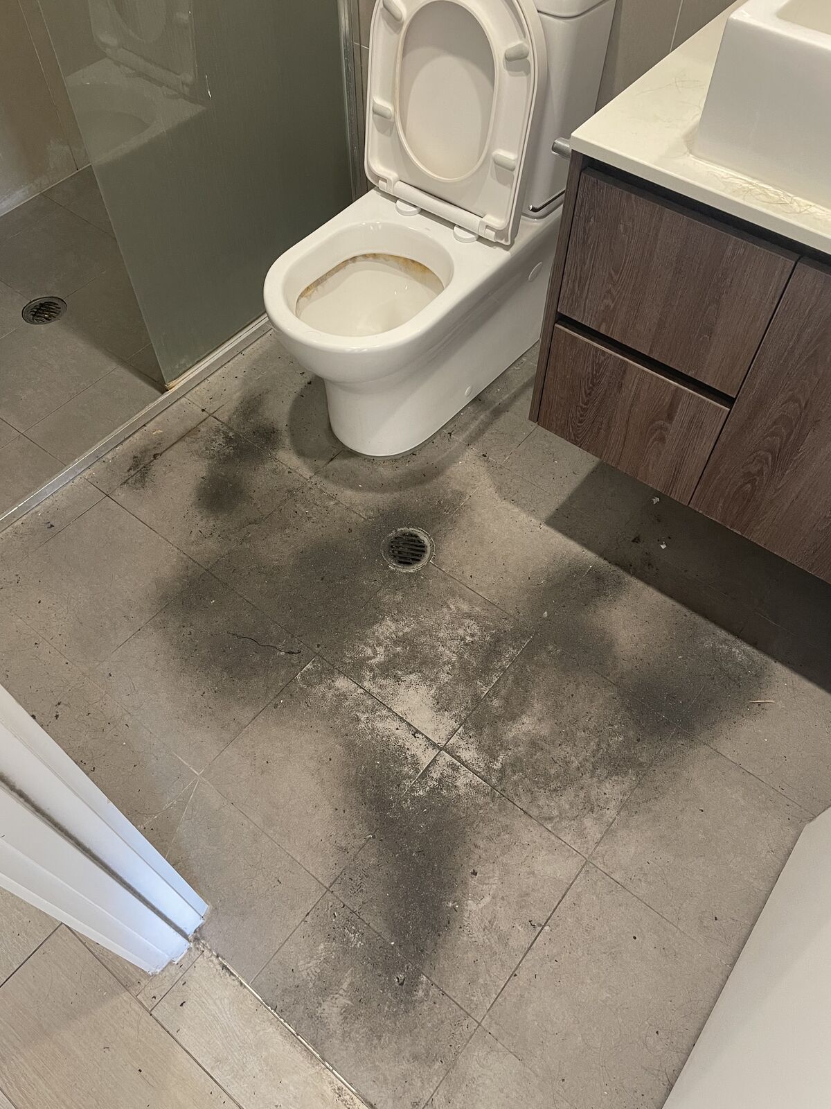 Bathroom floor before cleaning